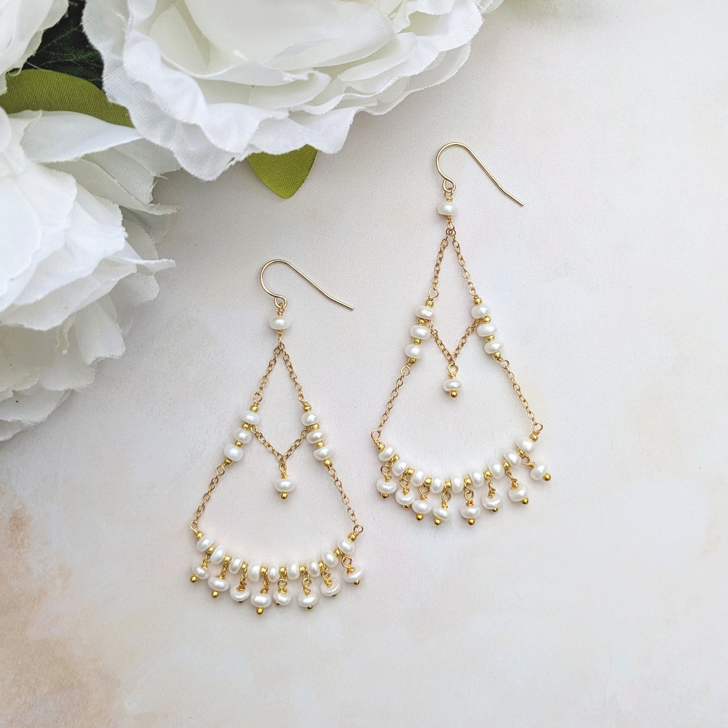 Gold pearl chandelier earrings designed & handmade by Susie Warner.