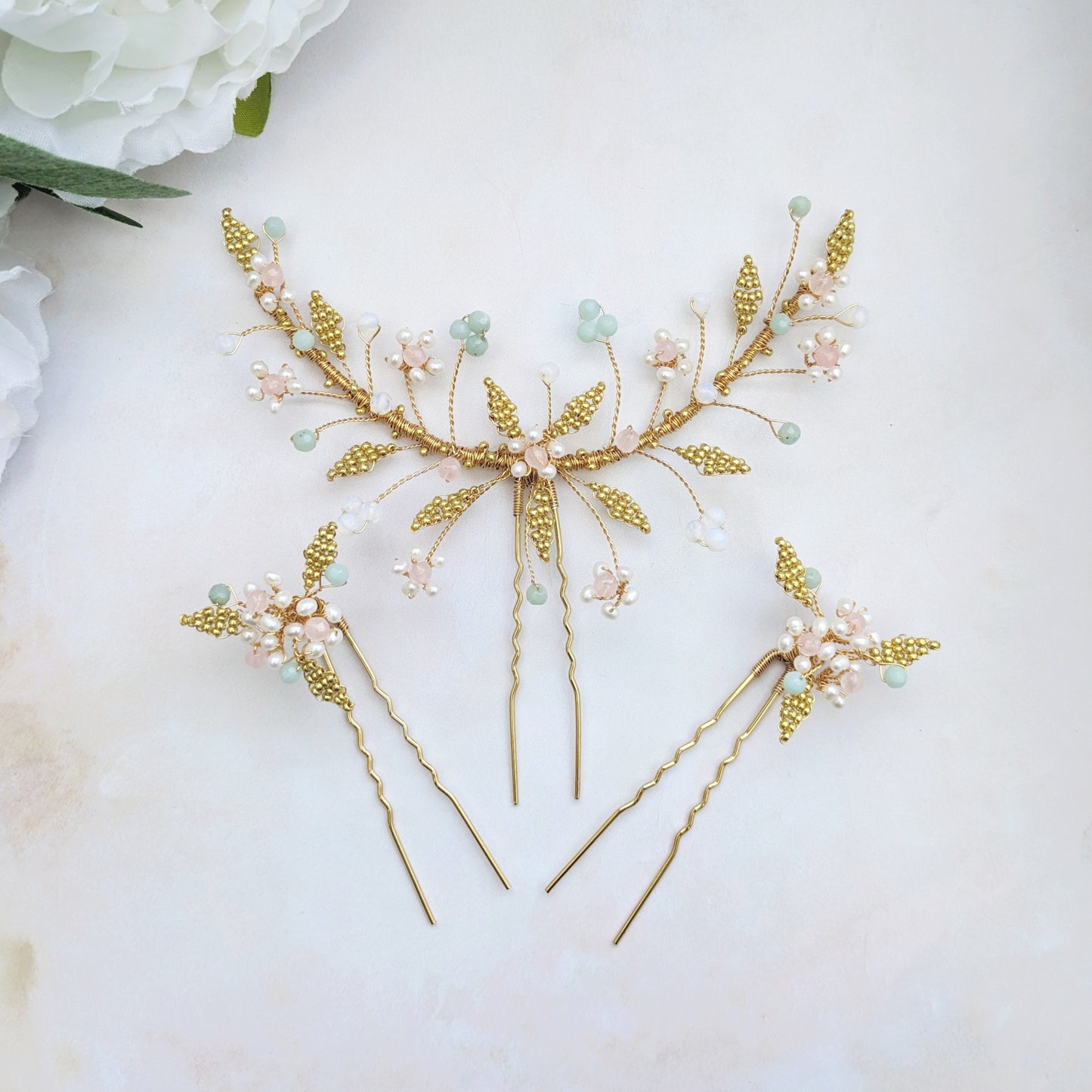 Statement pink, green and gold nature inspired hair pins designed & handmade by Susie Warner.