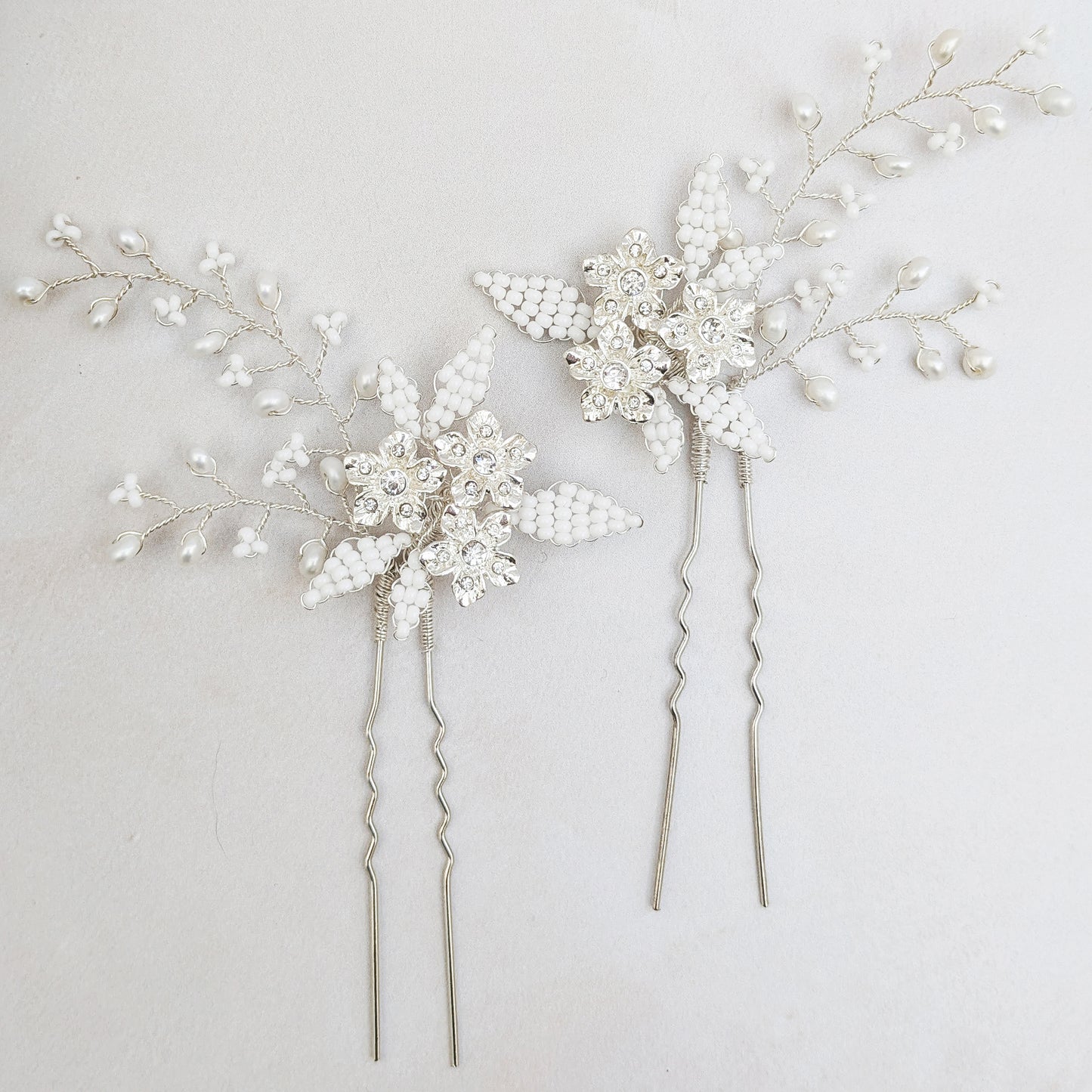 Silver floral hair pins with beaded leaves designed & handmade by Susie Warner.
