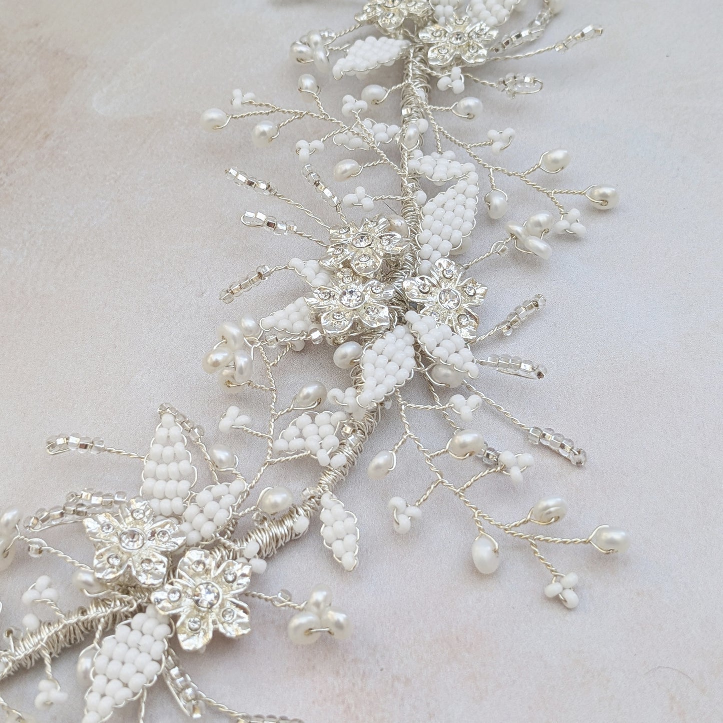 Silver floral bridal hair accessories designed & handmade by Susie Warner.