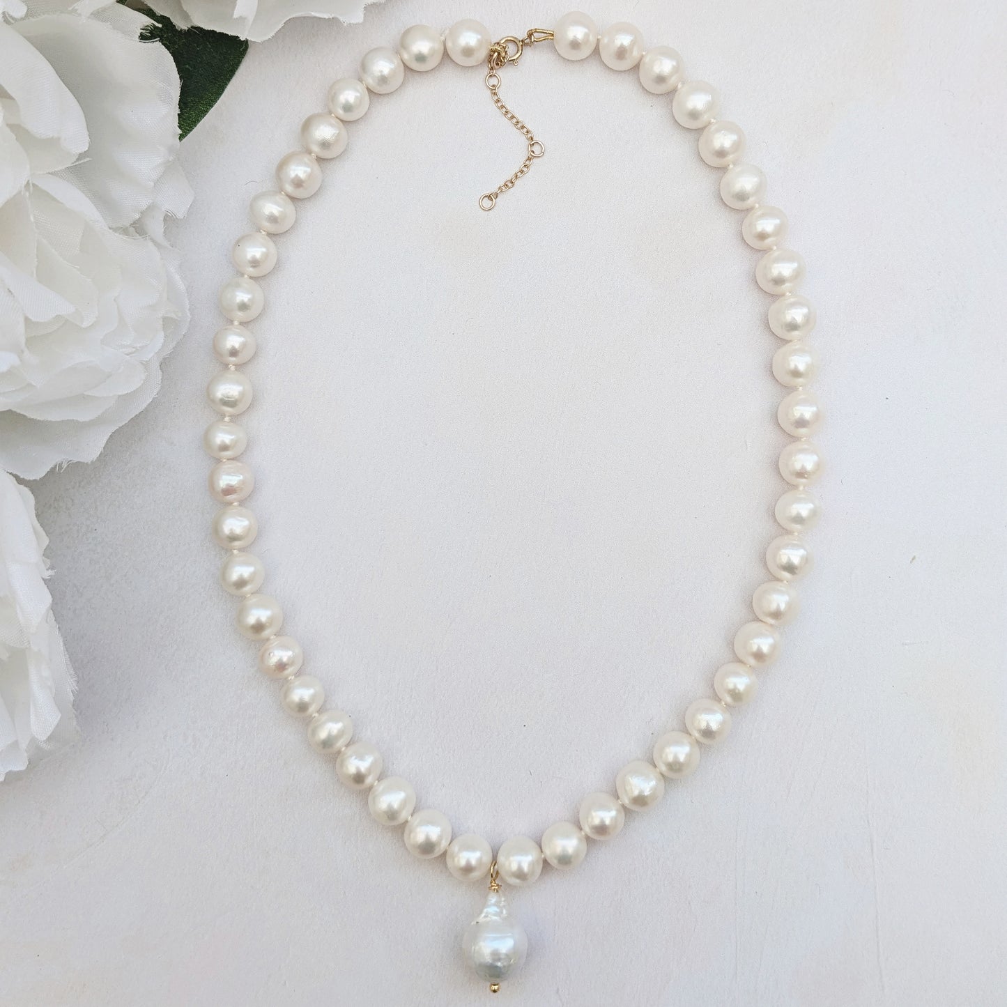 Statement pearl necklace with baroque pearl pendant for brides designed & handmade by Susie Warner.