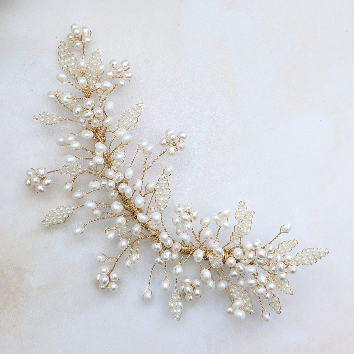 Statement freshwater pearl floral headpiece for weddings designed & handmade by Susie Warner.