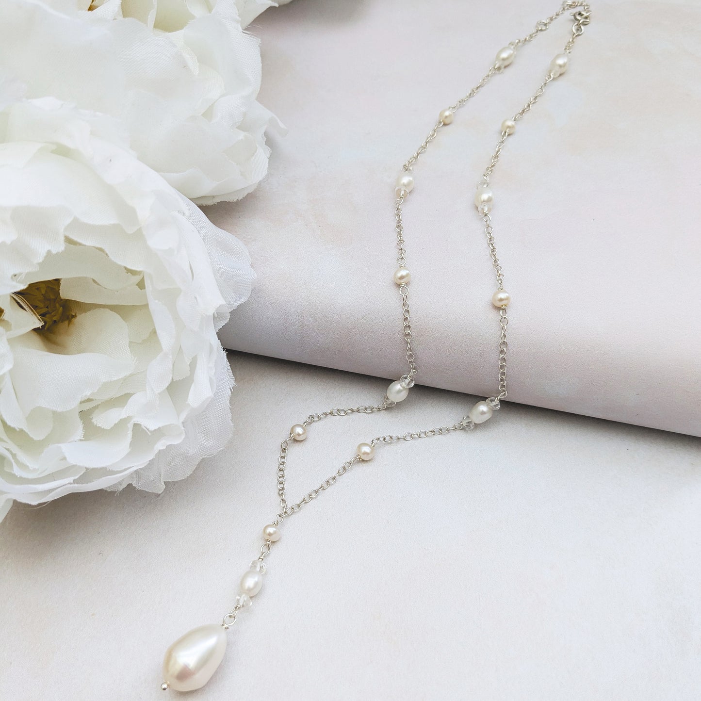 Pearl & white topaz stationed bridal jewellery designed & handmade by Susie Warner.