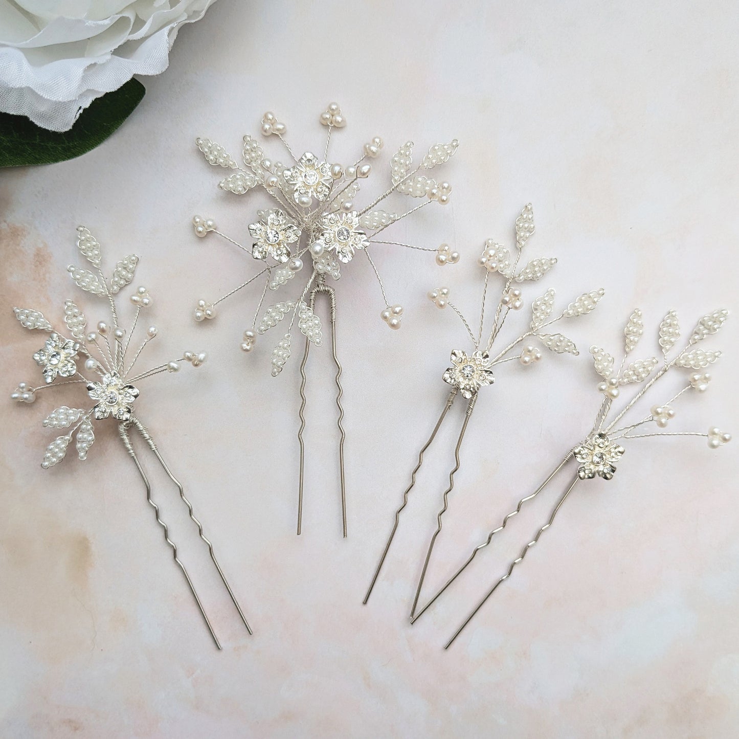 Statement floral bridal hair pins for weddings designed & handmade by Susie Warner.