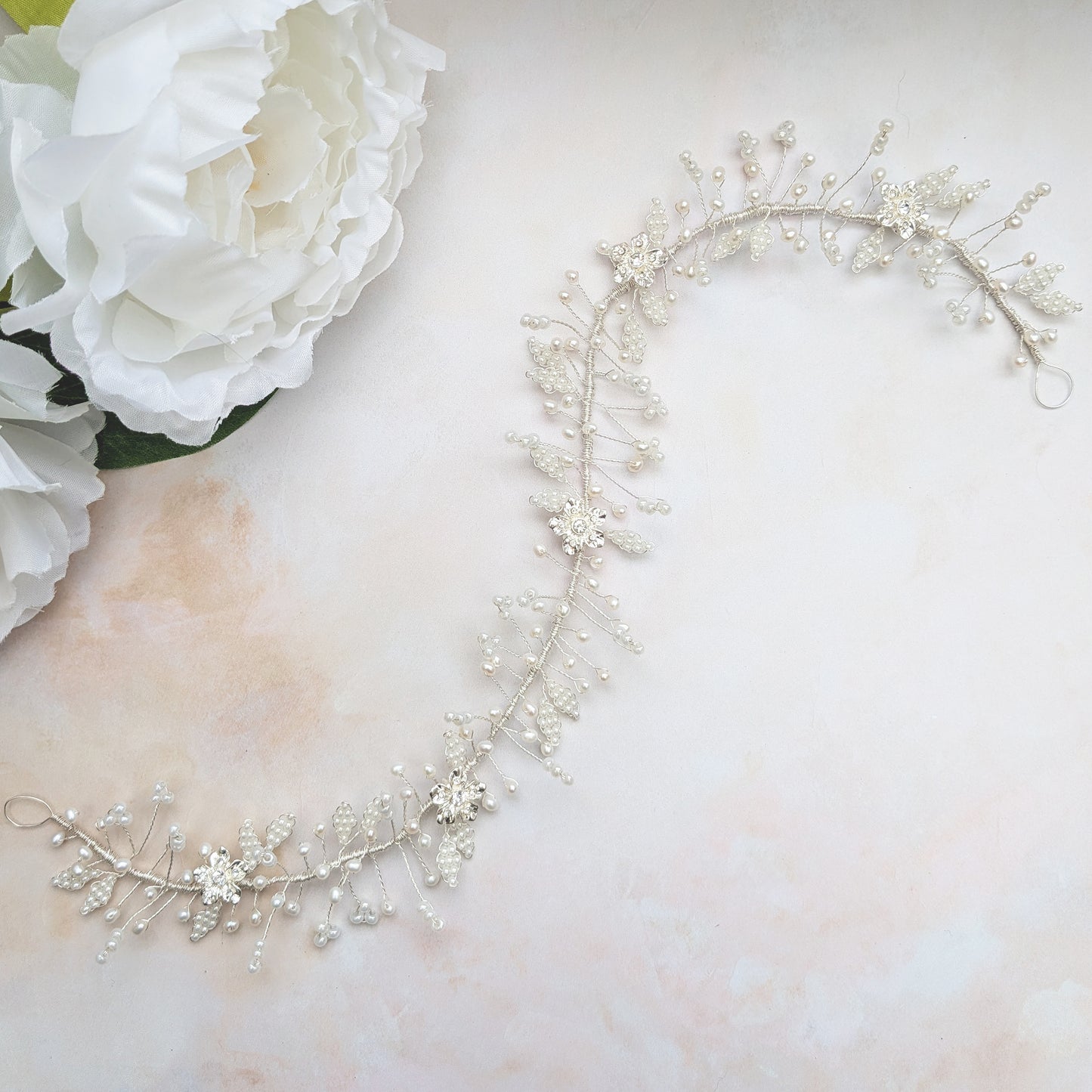 Modern floral bridal hair piece for weddings designed & handmade by Susie Warner.
