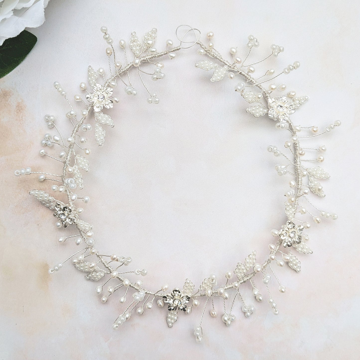 Modern floral wedding hairpiece with pearl leaves designed & handmade by Susie Warner.