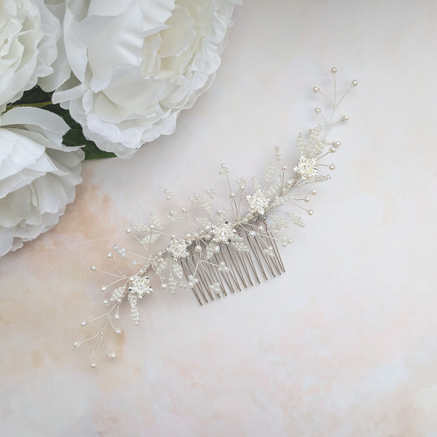 Nature inspired pearl & crystal floral wedding headpiece for brides designed & handmade by Susie Warner.