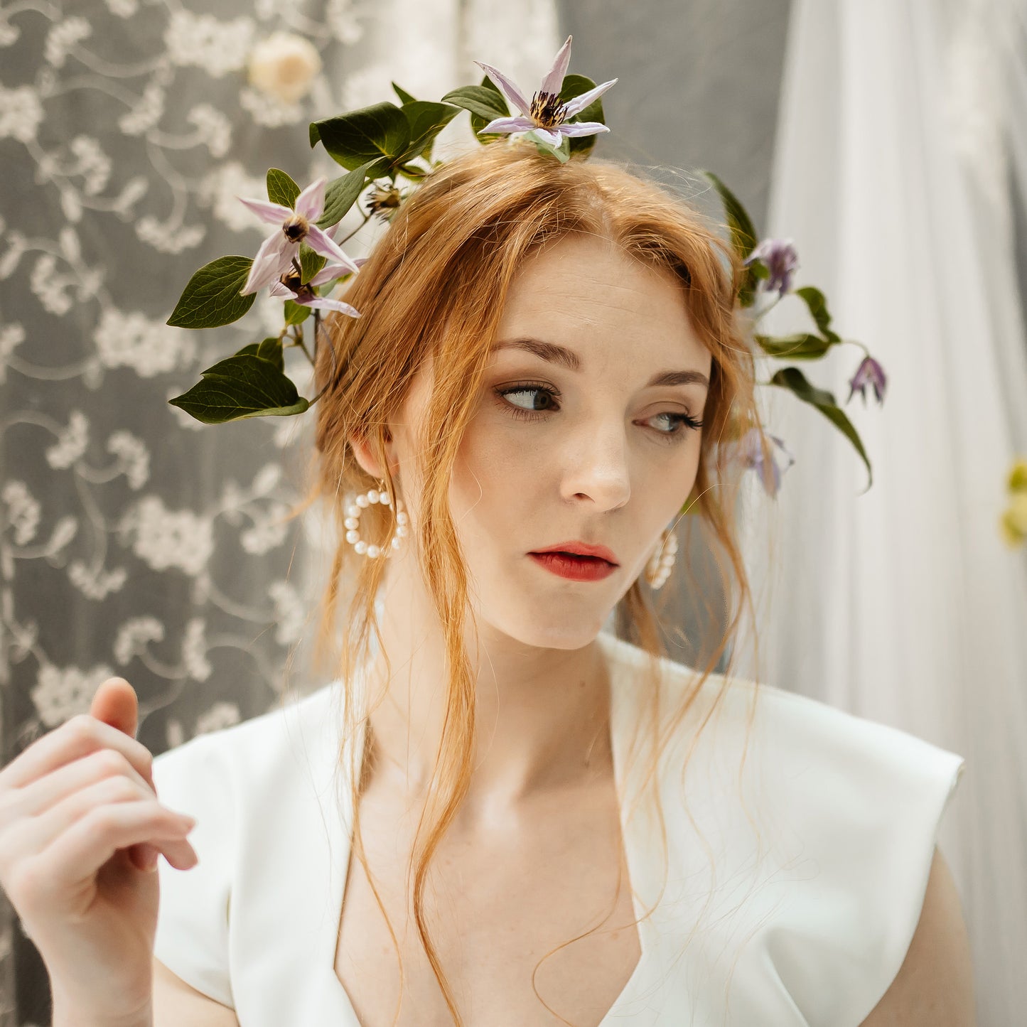 Amber Gallagher wearing modern pearl hoop wedding earrings for brides designed & handmade by Susie Warner