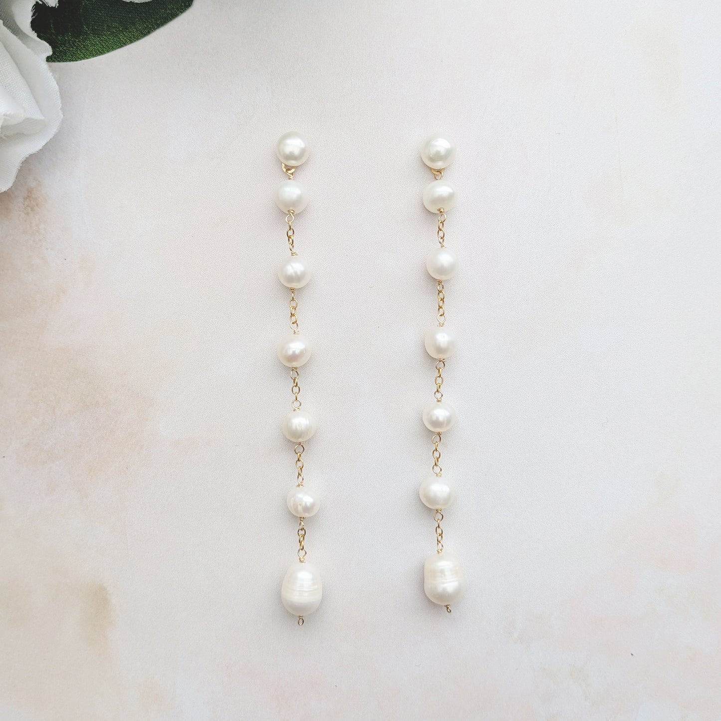 Statement pearl butterfly drop earrings with front and back drops for brides designed & handmade by Susie Warner.