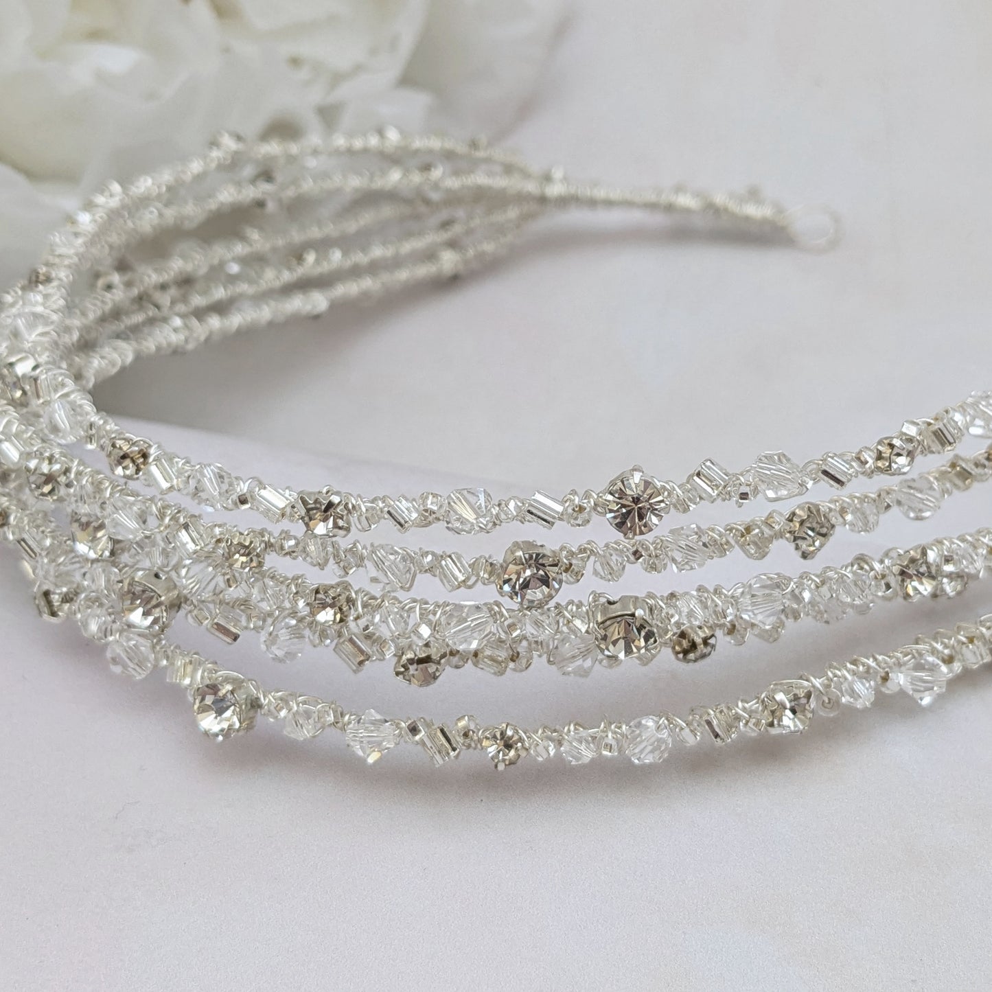Detail of layered crystal headpiece for modern brides designed & handmade by Susie Warner.