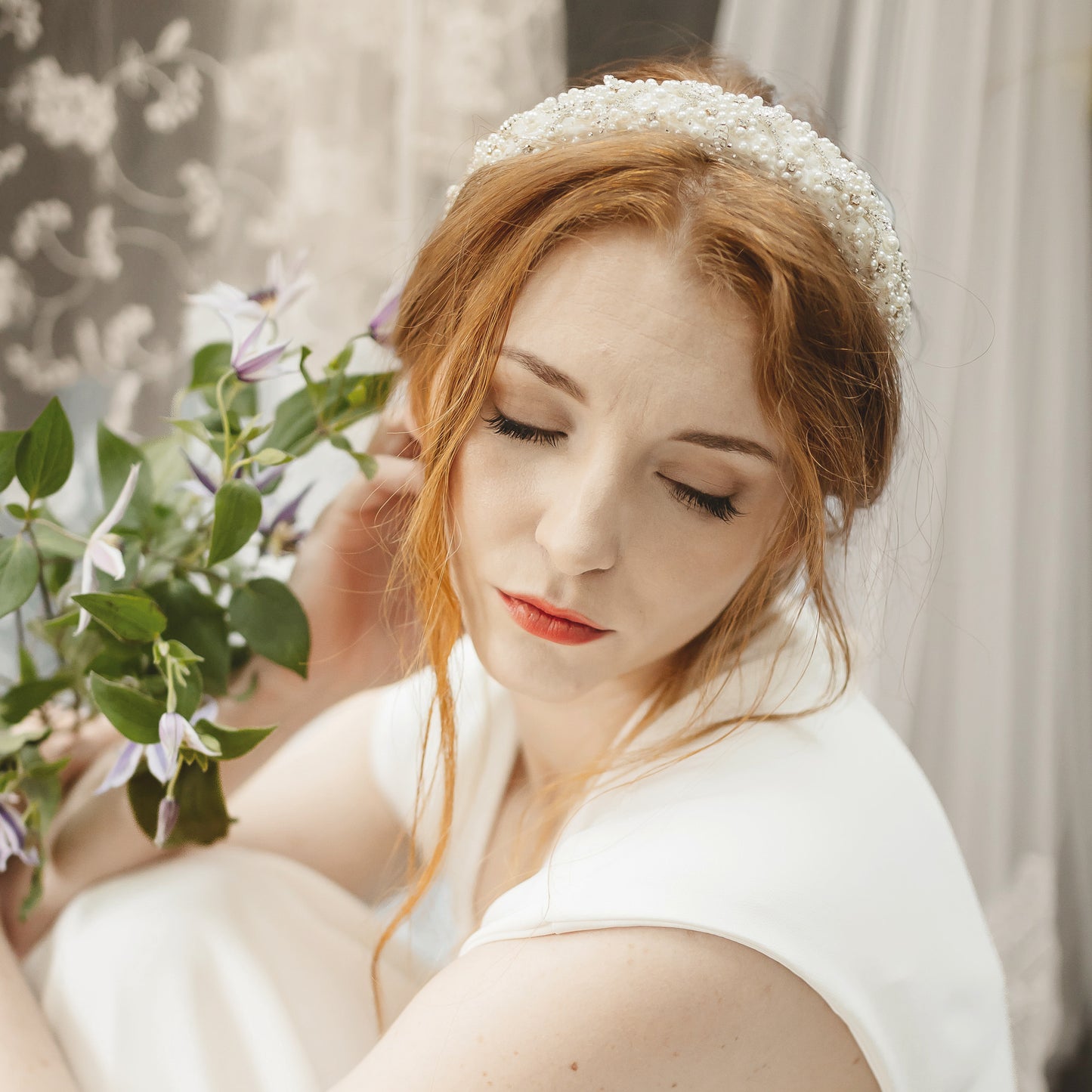 Amber Gallagher wearing statement modern pearl wedding headband for brides designed & handmade by Susie Warner.