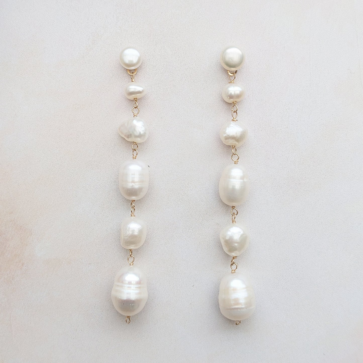 Statement baroque pearl dangle earrings for brides designed & handmade by Susie Warner.