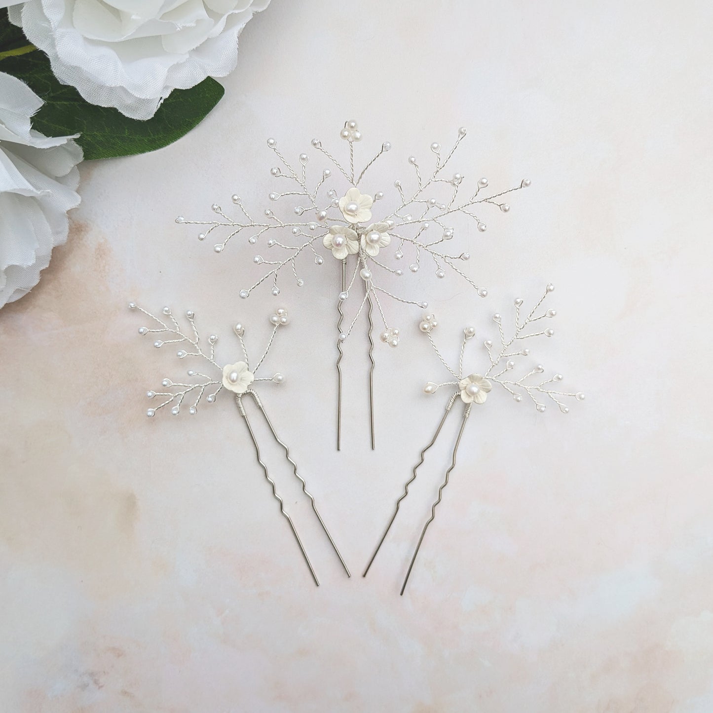 Modern floral hair pins for brides designed & handmade by Susie Warner.