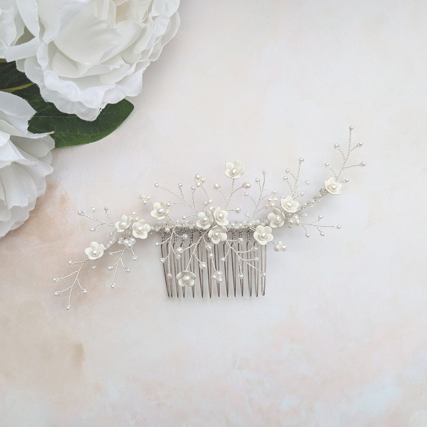 Nature inspired floral bridal headpiece with white flowers & pearls designed & handmade by Susie Warner.