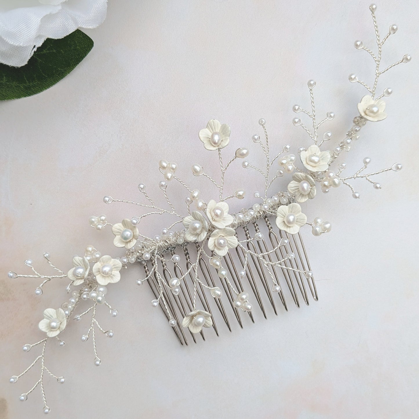 Modern nature inspired floral headpiece for weddings designed & handmade by Susie Warner.