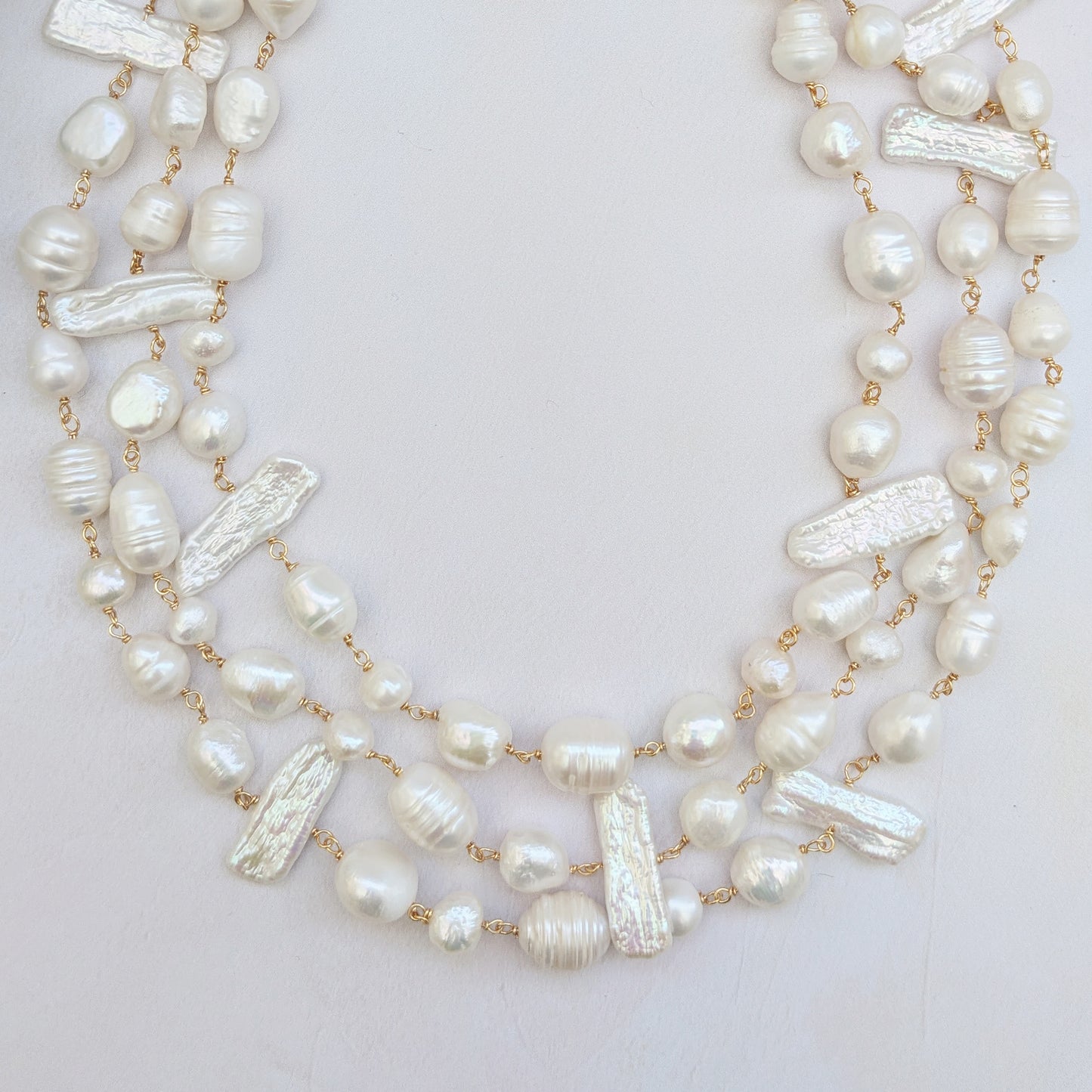 Statement pearl layered three strand necklace for brides designed & handmade by Susie Warner.