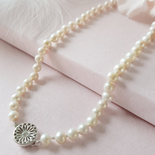 Pearl necklace with filigree Silver CZ clasp designed & handmade by  Susie Warner.
