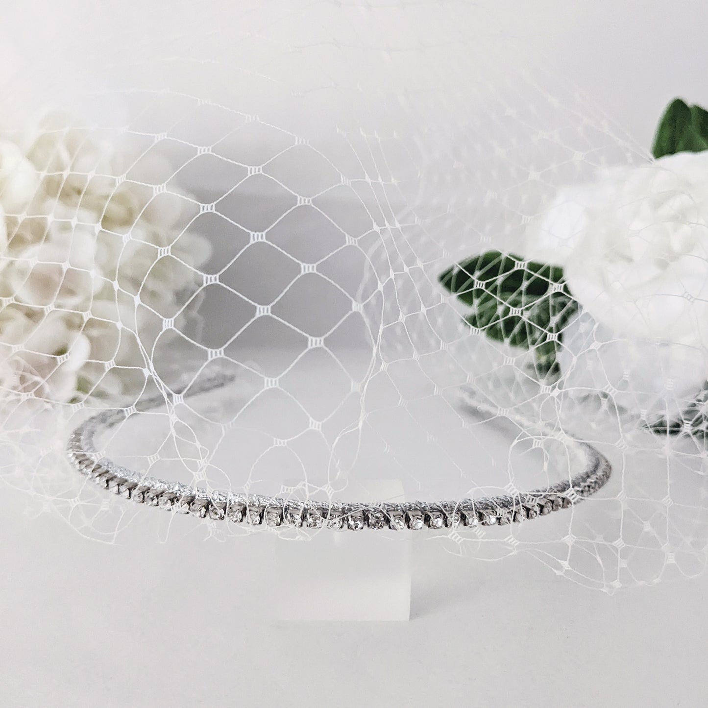 Modern crystal birdcage veil headband for weddings designed & handmade by Susie Warner.