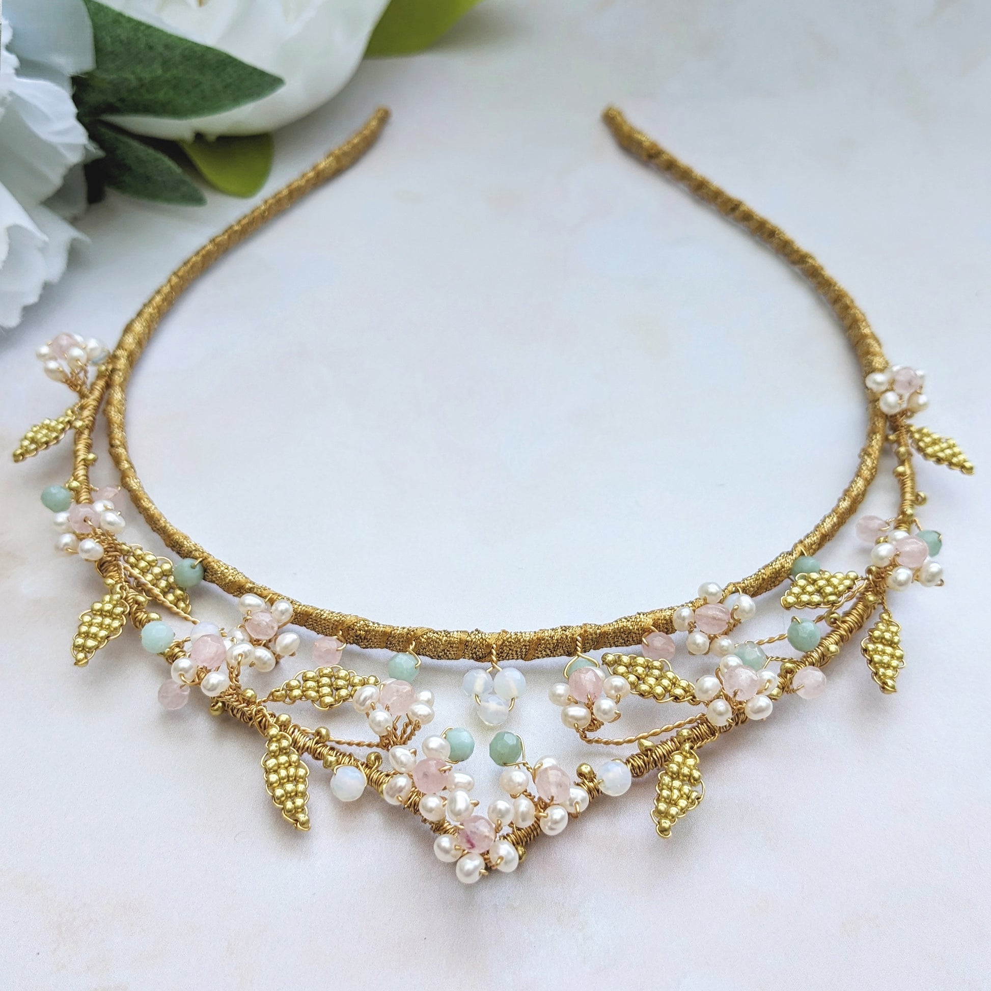 Statement semi precious bridal crown with rose quartz & pearls inspired by nature designed & handmade by Susie Warner.