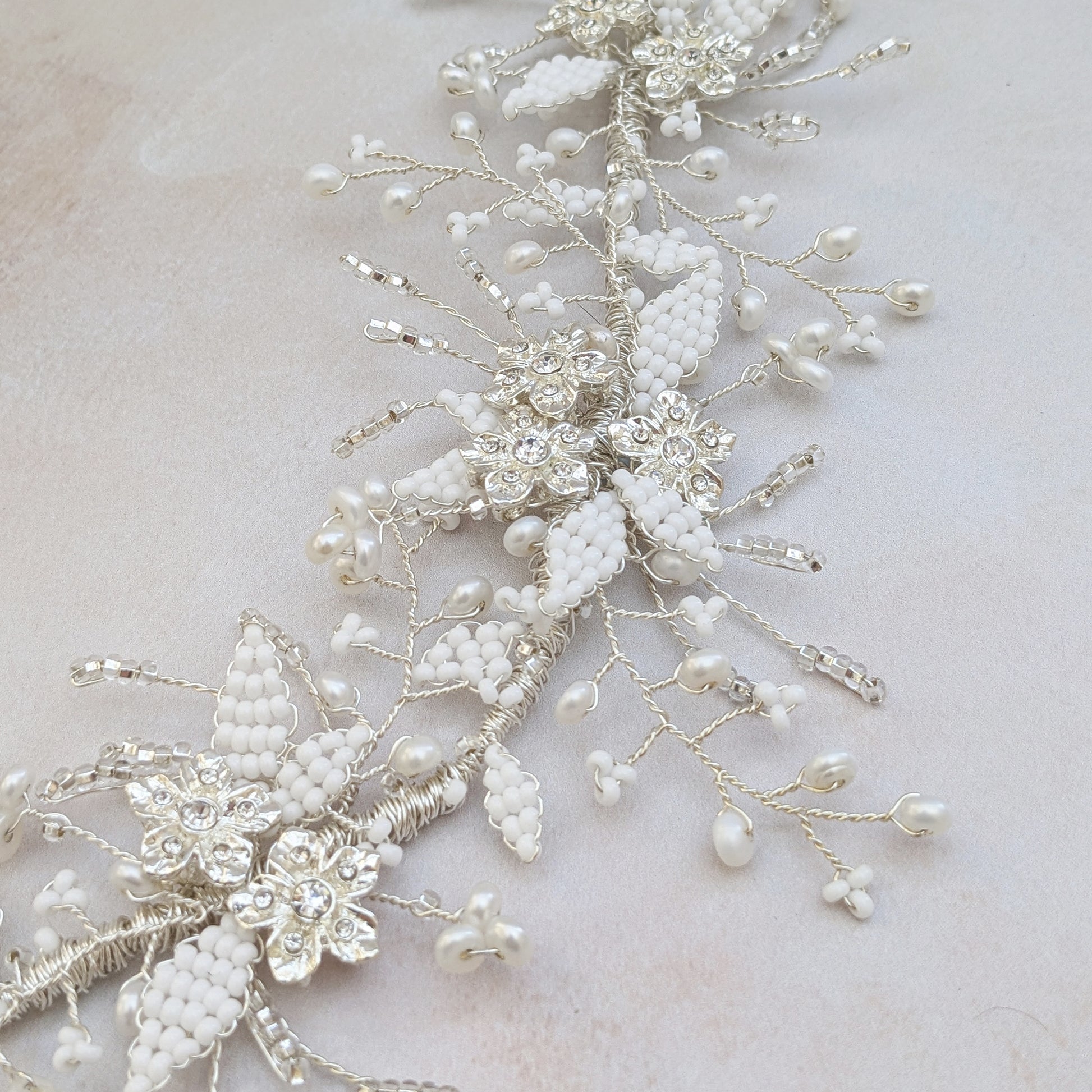 Silver floral bridal hair accessories designed & handmade by Susie Warner.
