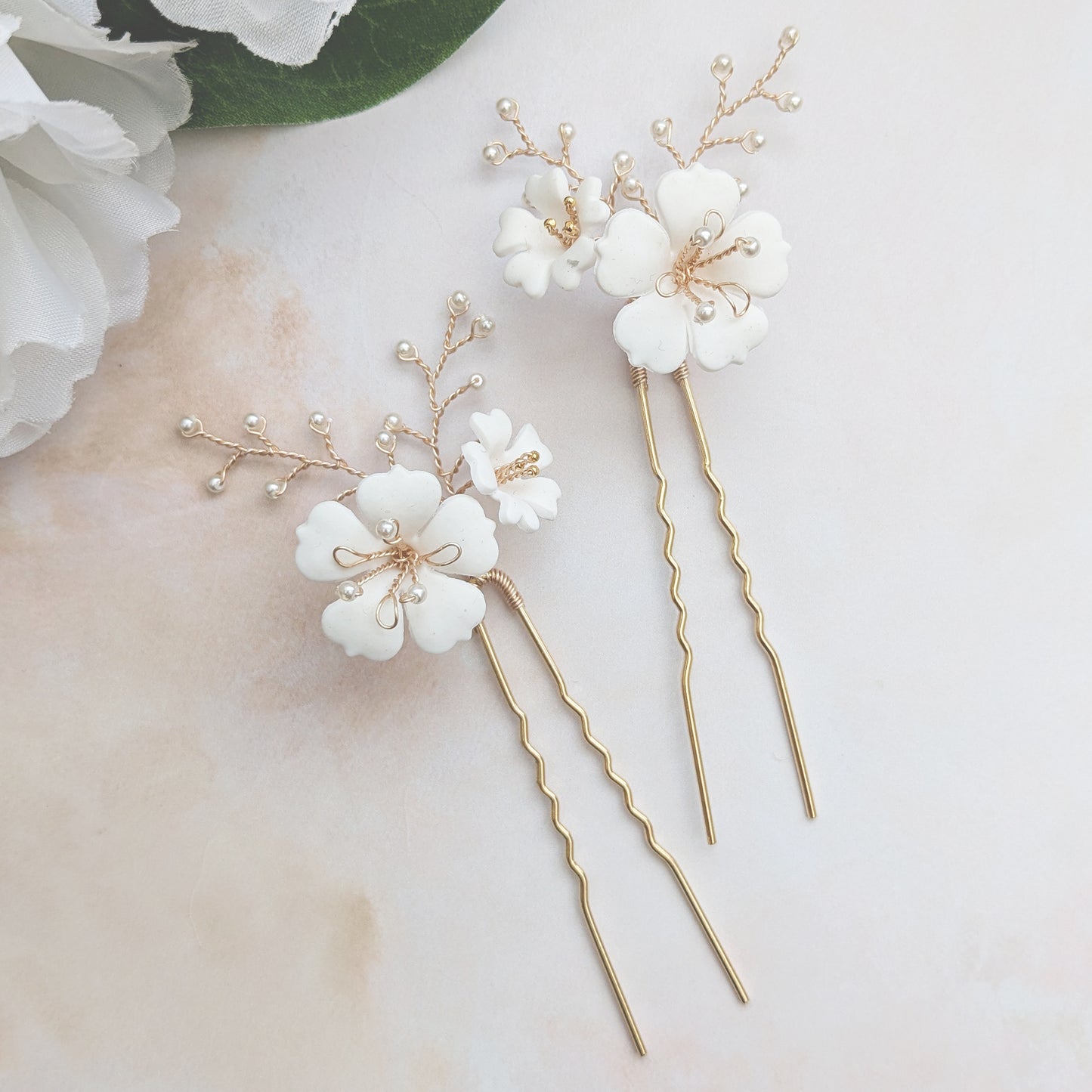 Detail of small floral hair pins for brides designed & handmade by Susie Warner.