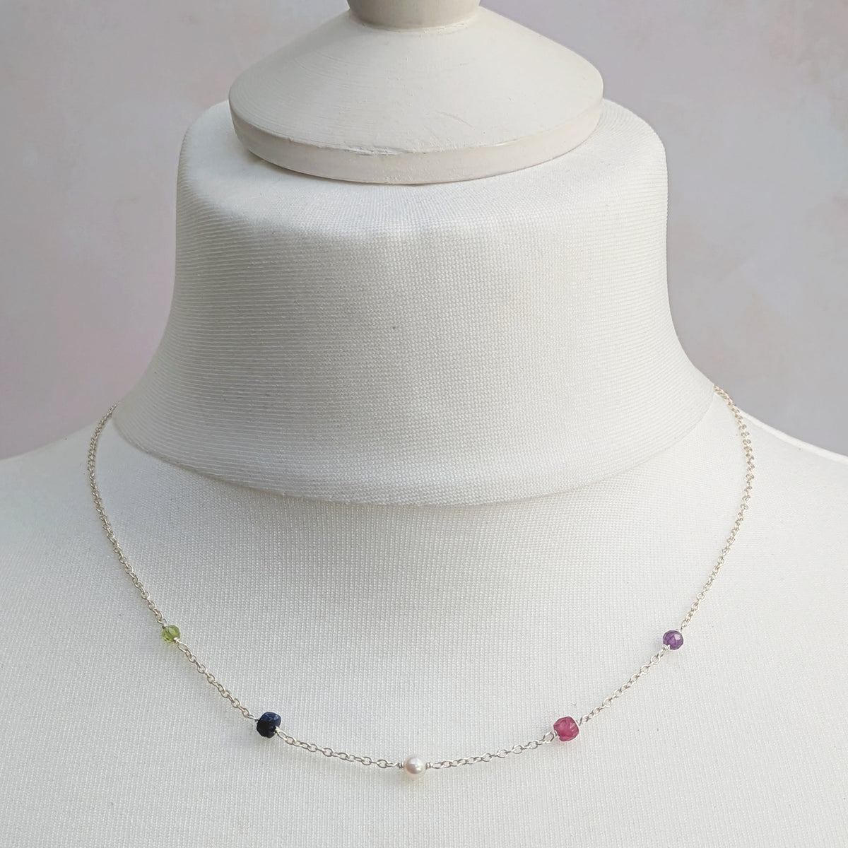 Personalised sterling silver family birthstone necklace  featuring natural ethically sourced gemstone beads .