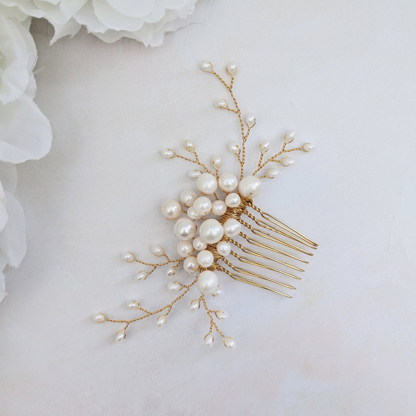 Pearl  hair comb for brides to be worn at the side of a low bun designed & handmade by Susie Warner.