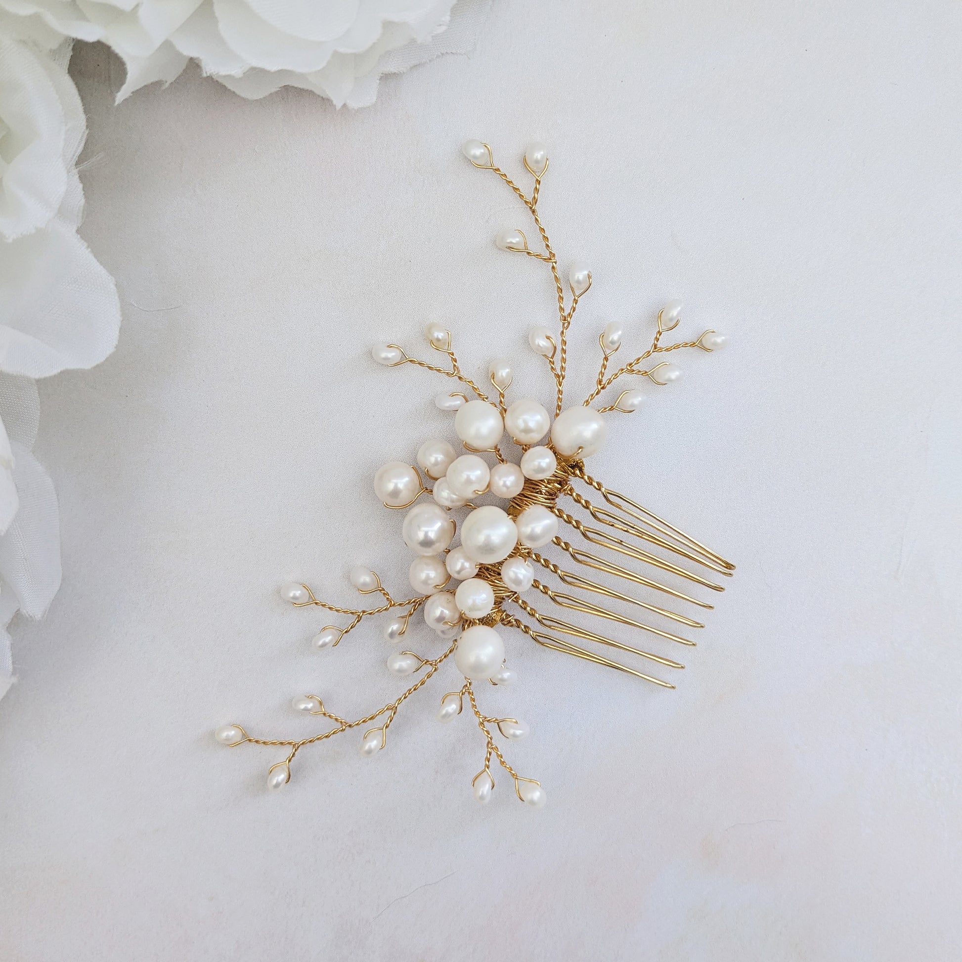 Pearl  hair comb for brides to be worn at the side of a low bun designed & handmade by Susie Warner.