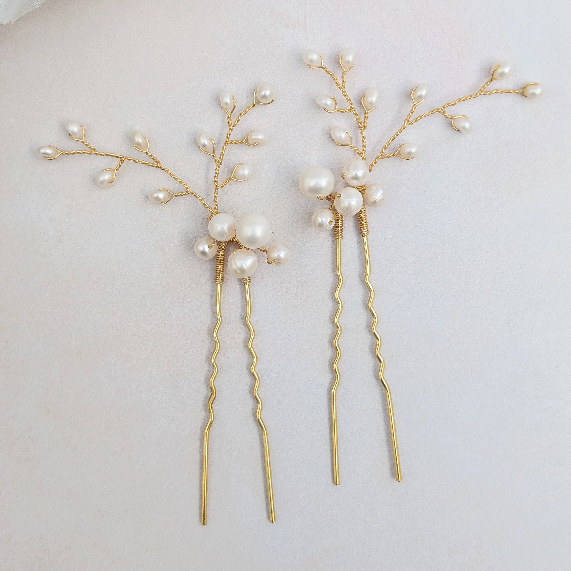 Bridal hair pins with clusters of Pearls  designed & handmade by Susie Warner.