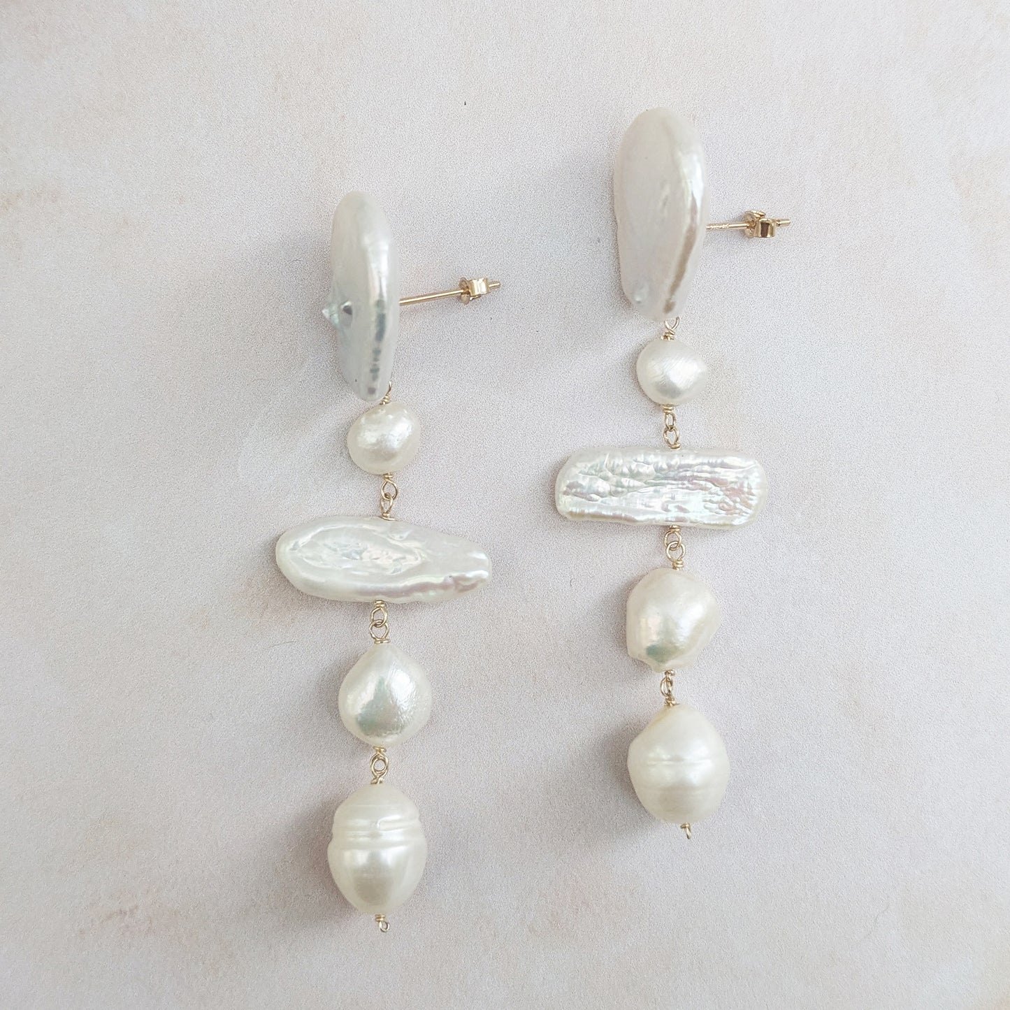 Statement gold pearl stud earrings for brides designed & handmade by Susie Warner.