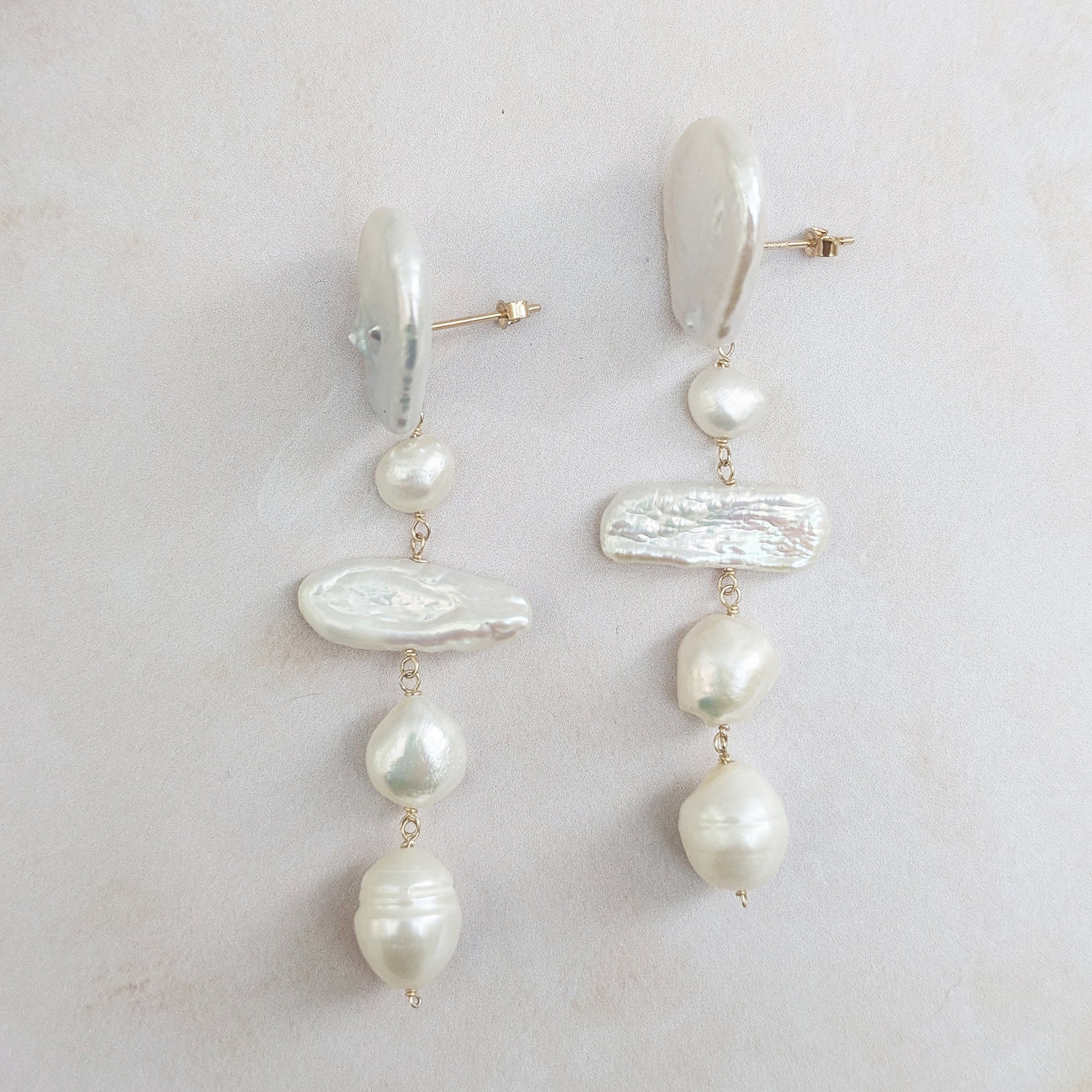 Statement gold pearl stud earrings for brides designed & handmade by Susie Warner.