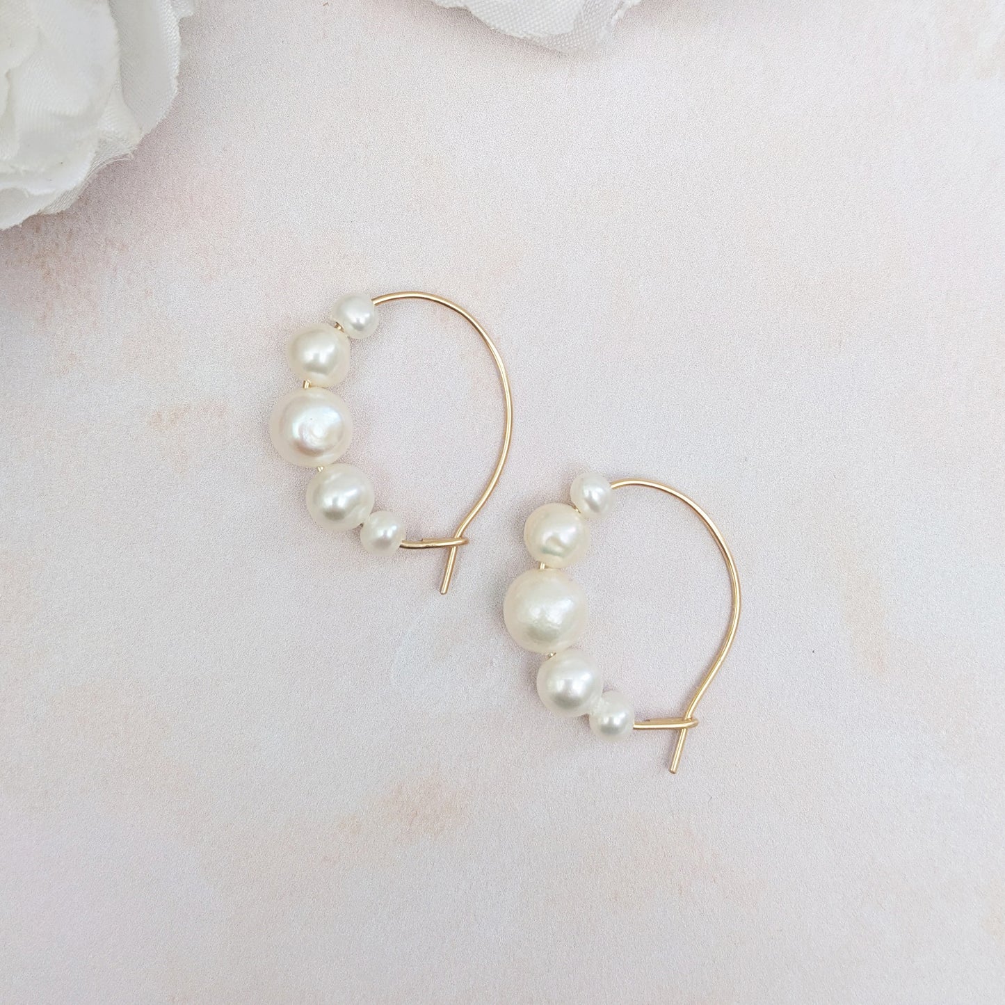 Statement graduated pearl hoop earrings for brides designed & handmade by Susie Warner.
