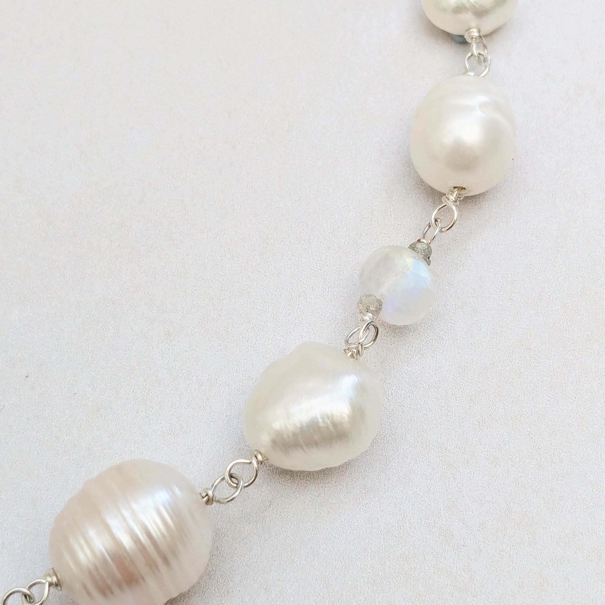 Detail of pearl, moonstone & diamond nugget necklace for brides designed & handmade by Susie Warner.