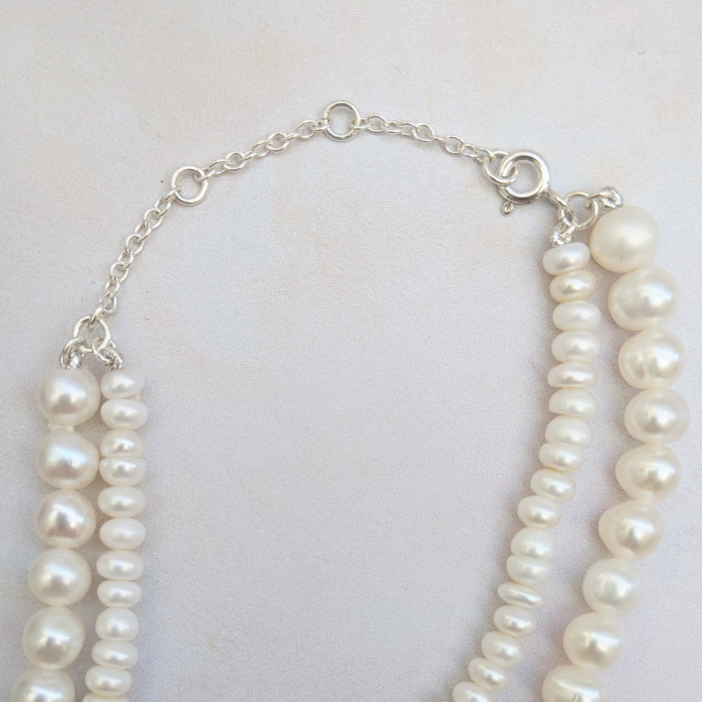 Adjustable statement pearl knot necklace for brides designed & handmade by Susie Warner.