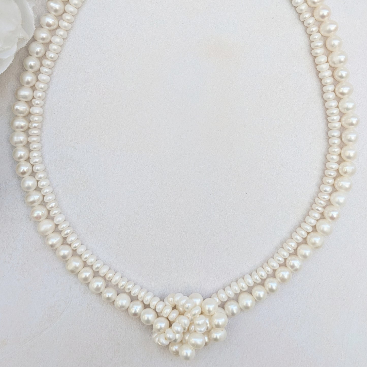 Statement multi strand pearl knot necklace for brides designed & handmade by Susie Warner.