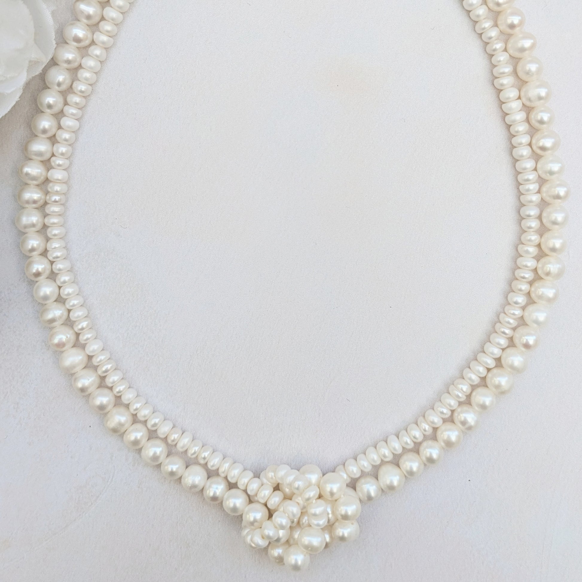 Statement multi strand pearl knot necklace for brides designed & handmade by Susie Warner.