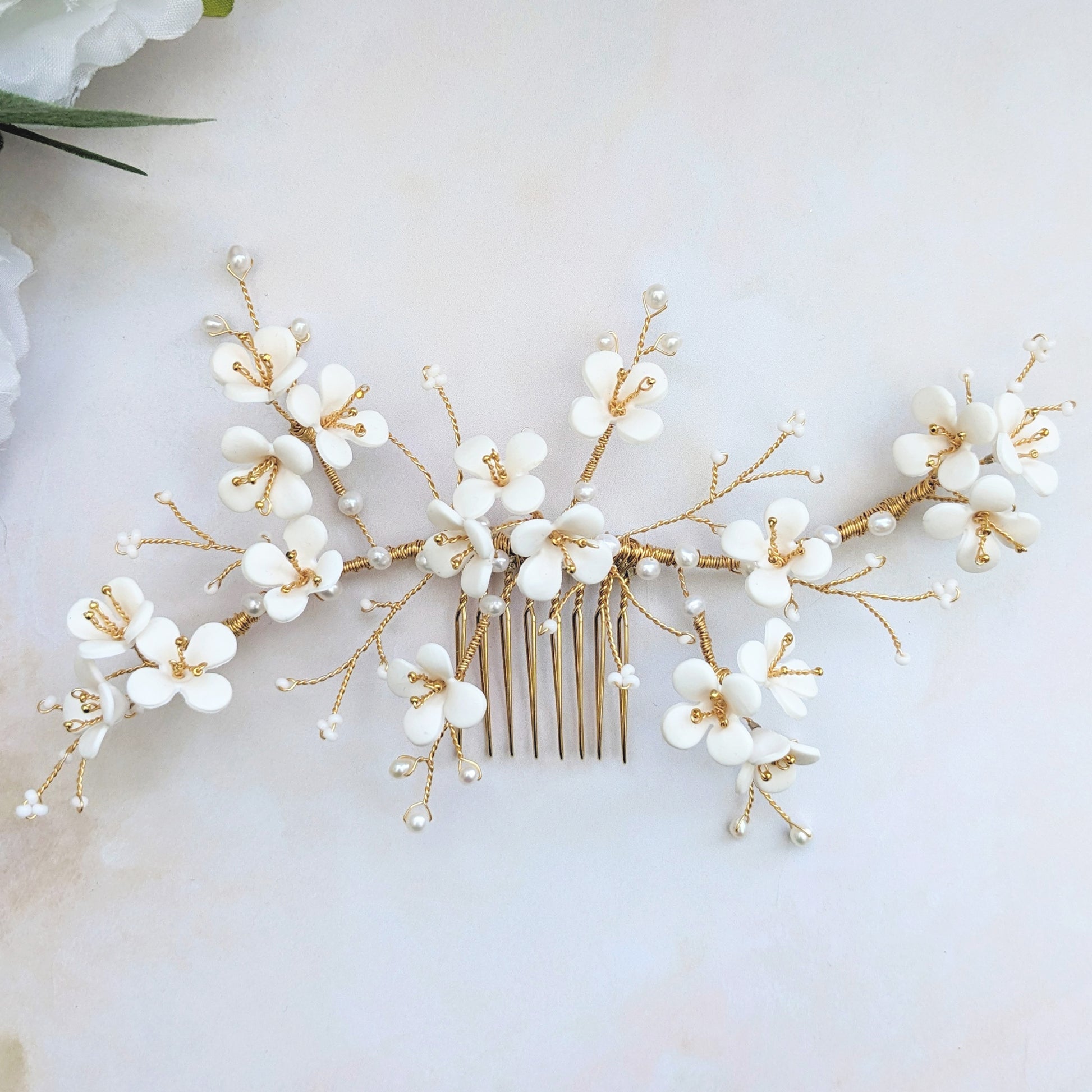 Statement sculpted clay floral bridal hair accessories for weddings designed & handmade by Susie Warner.