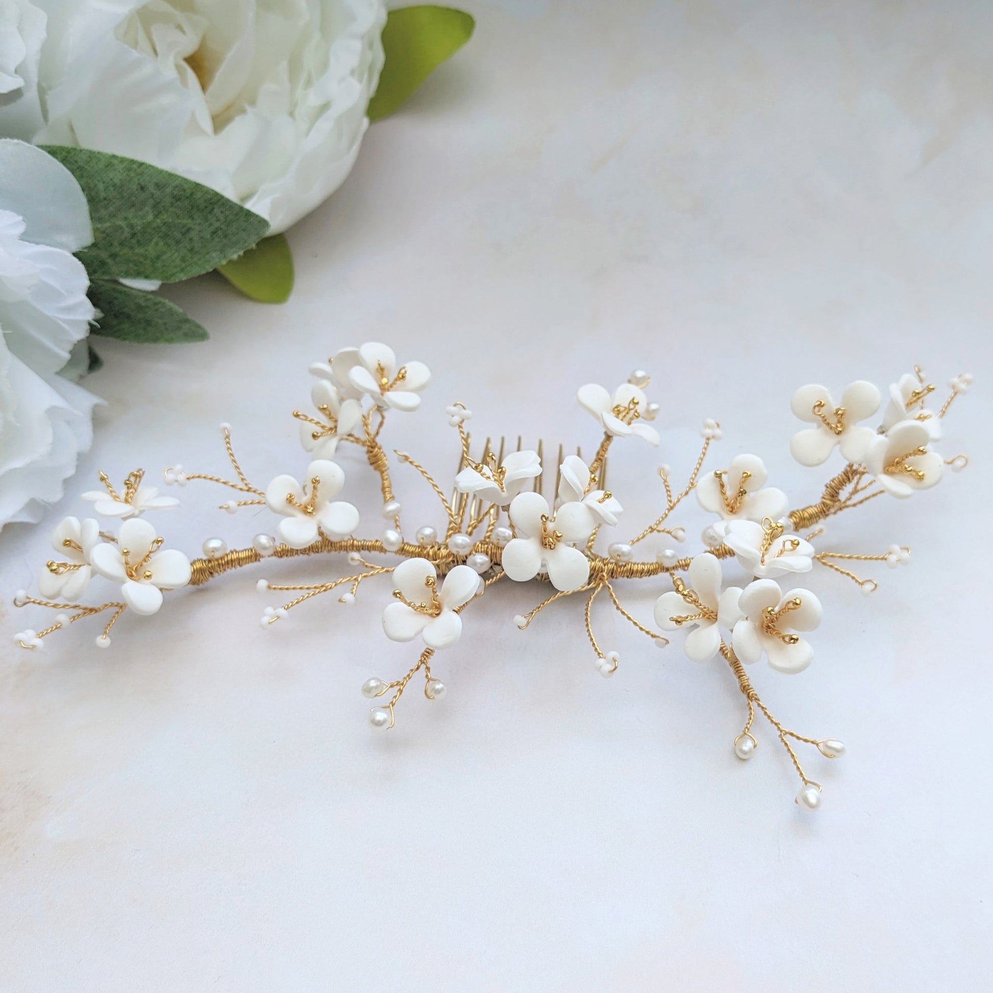 Statement modern floral wedding hair accessories for brides designed & handmade by Susie Warner.