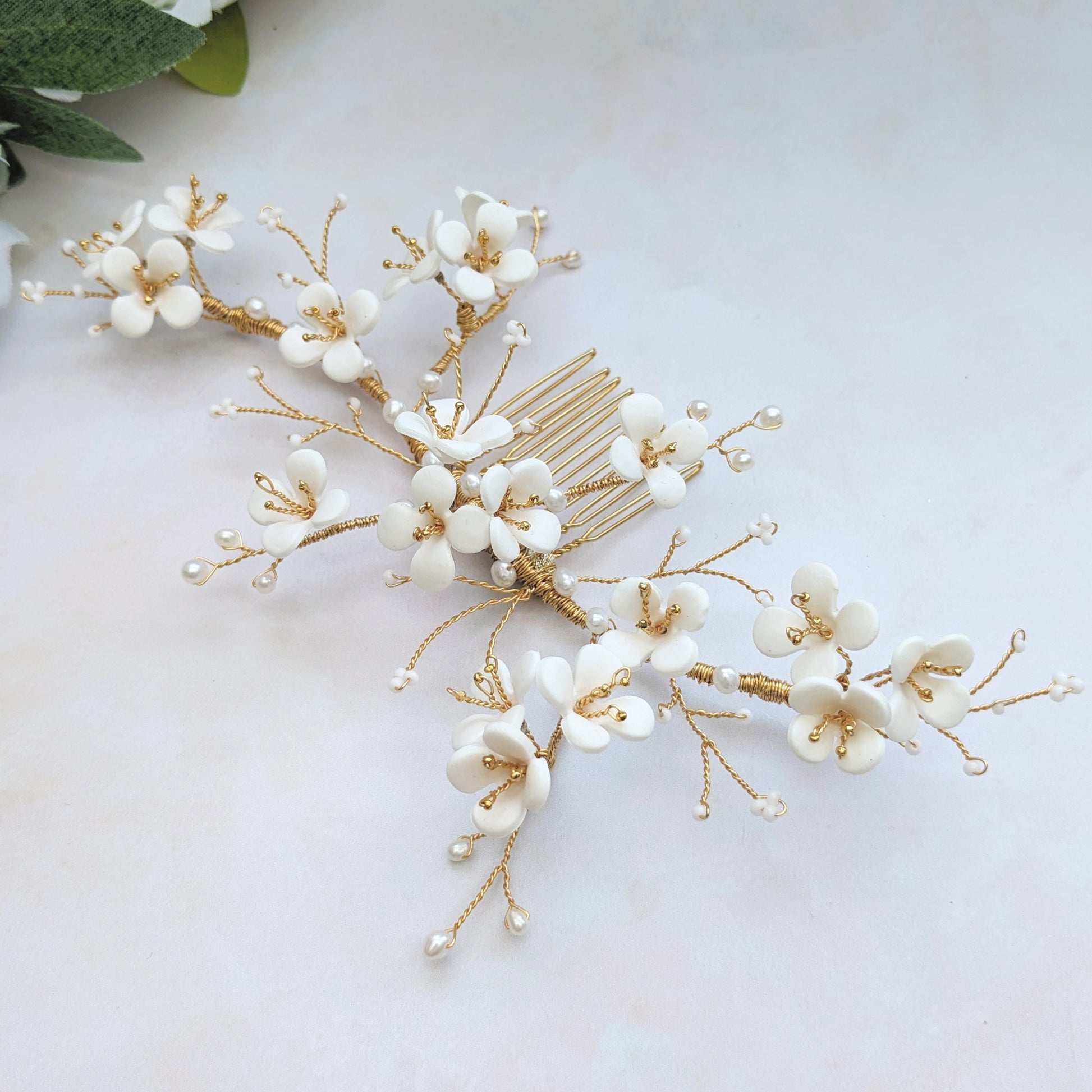 Statement hand sculpted Clay flower luxury bridal headpiece for weddings designed & handmade by Susie Warner.
