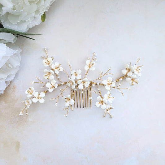 Statement modern hand sculpted floral wedding headpiece for brides designed & handmade by Susie Warner.