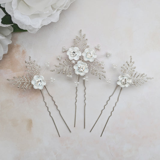 Statement modern floral hair pins for brides designed & handmade by Susie Warner.