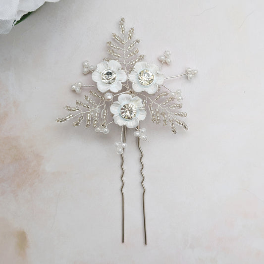 Large white floral hair pin detail - designed & handmade by Susie Warner.