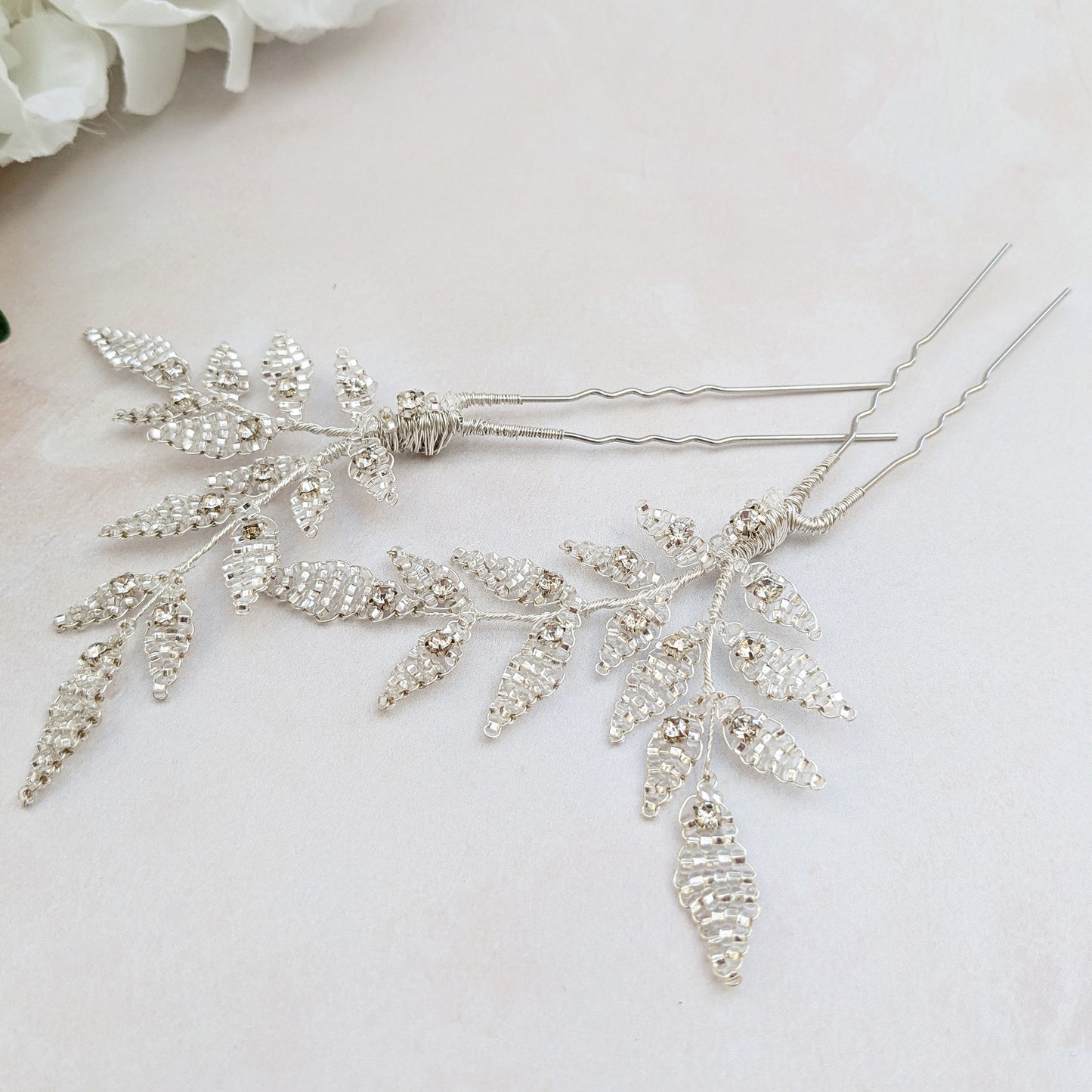 Botanical silver leaf hair pins for modern brides designed & handmade by Susie Warner.