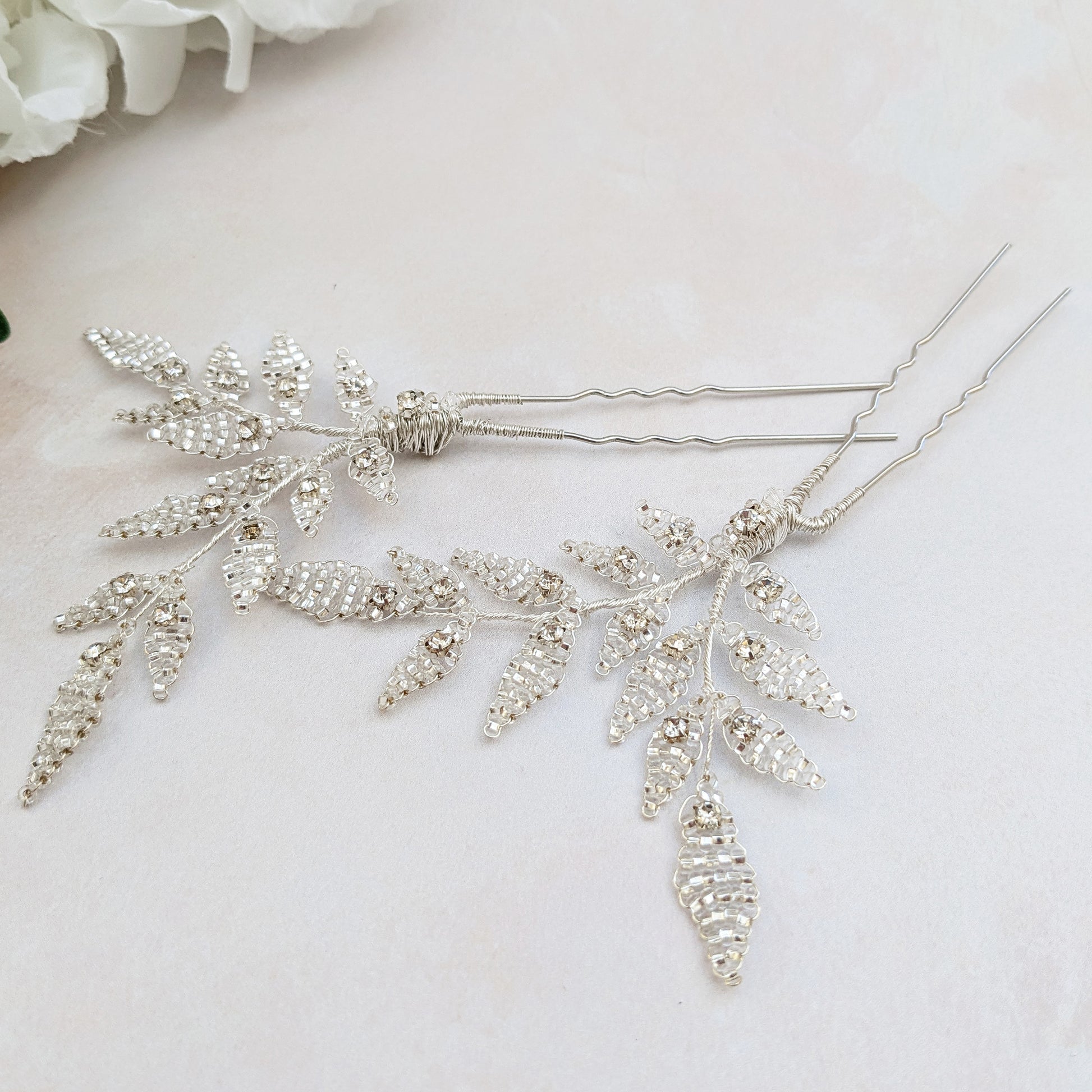 Botanical silver leaf hair pins for modern brides designed & handmade by Susie Warner.