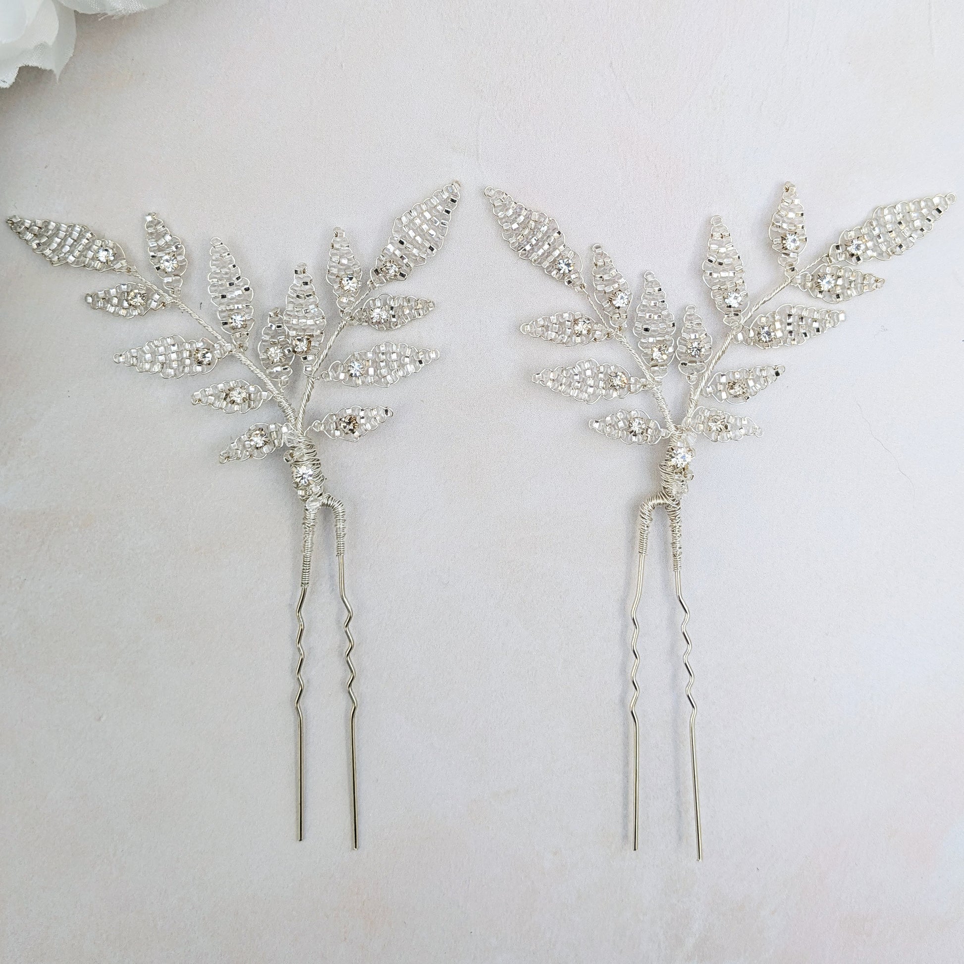 Modern silver leaf hair pins inspired by nature for brides designed & handmade by Susie Warner.