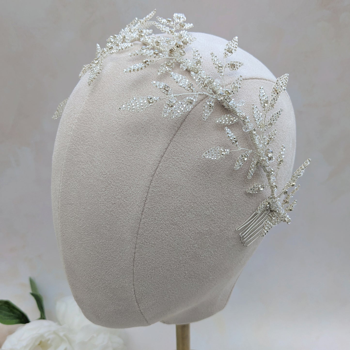 Nature inspired silver leaf headpiece worn as a tiara for modern brides designed & handmade by Susie Warner.
