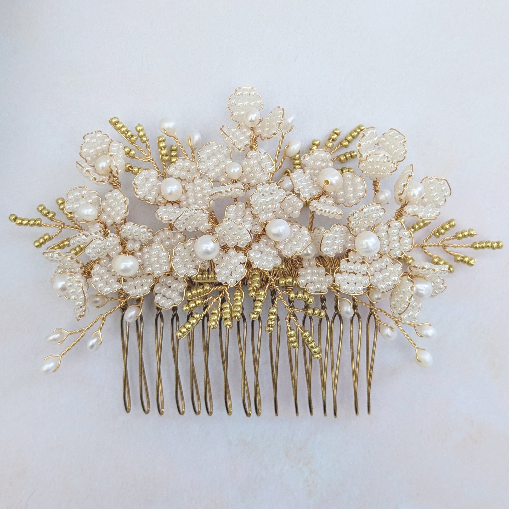 Botanical hair comb with pearl flowers for brides designed & handmade by Susie Warner.