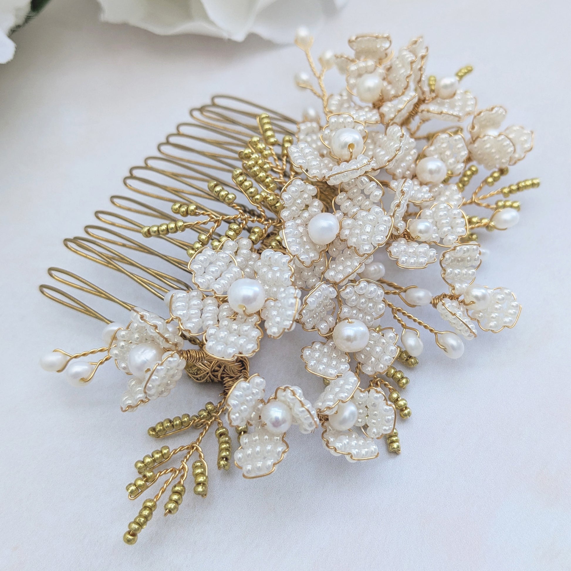 Nature inspired modern pearl floral headpiece for brides designed & handmade by Susie Warner.