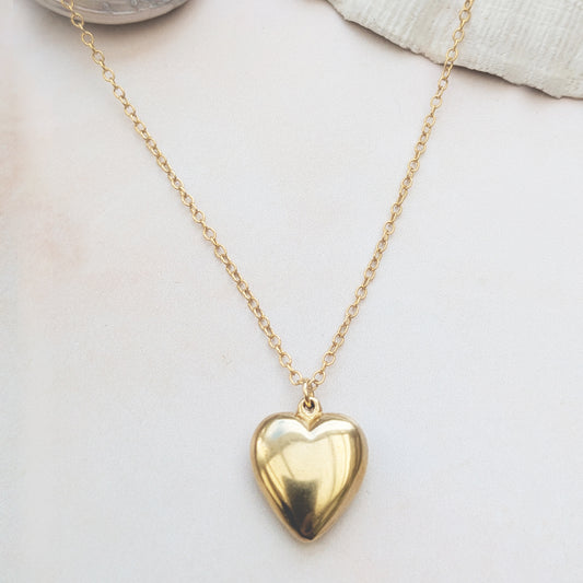 18ct Gold Vermeil heart necklace on a white background.