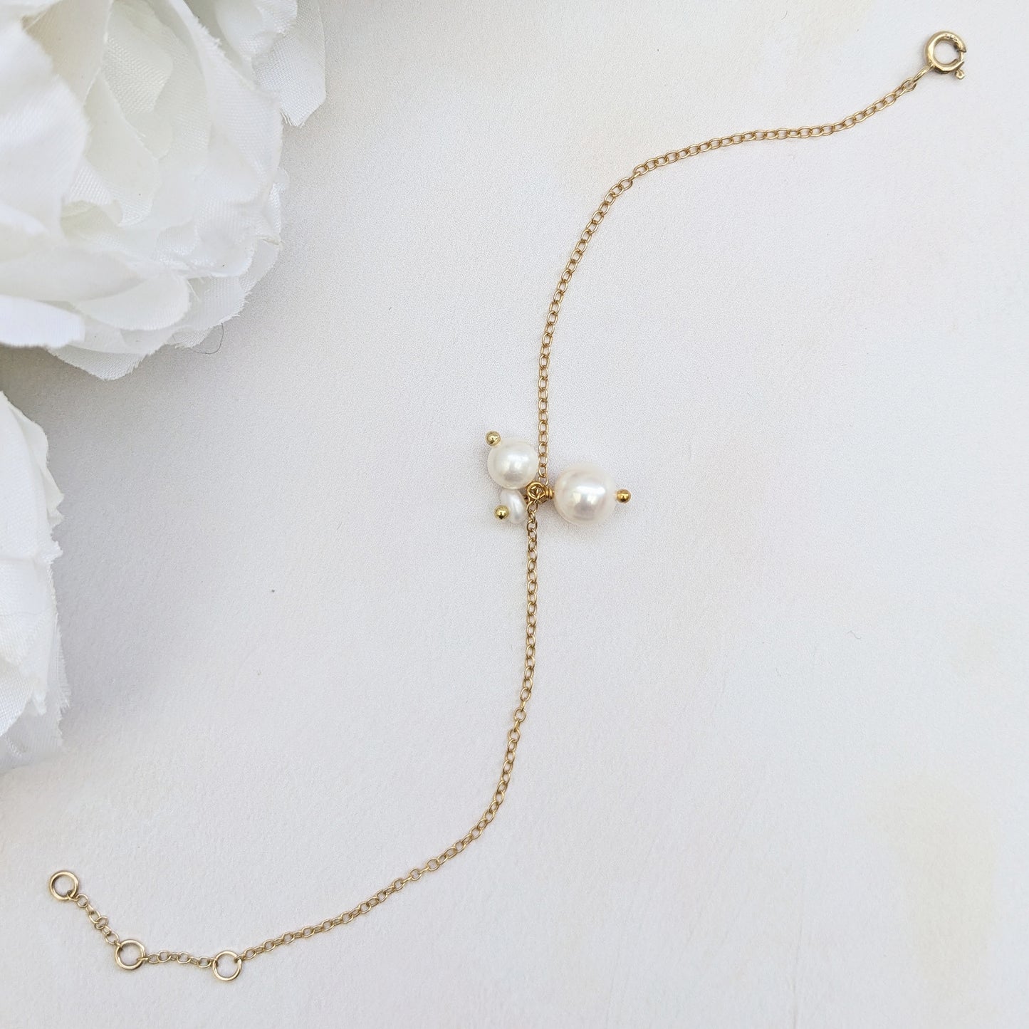 Adjustable small pearl cluster bracelet for brides & bridesmaids designed & handmade by Susie Warner.